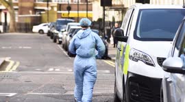 Police Forensic Scientist Seen Searching The Surrounding Of Flat At 6 Stanhope Place Where A Woman Was Stabbed To Death