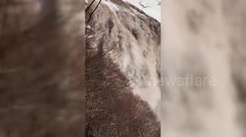 Avalanche cascades down Mount Fisht in Russia's Sochi