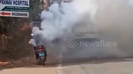 Huge cloud of smoke erupts out of burning electric scooter in South India