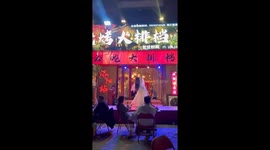Chinese restaurant owner wows crowd with her traditional dance moves
