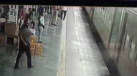 A passenger slipped and fell between the platform and the coach while attempting to board the train after departure of train on Northern India,RPF save his life