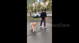 Man Racing with Dog in Yueyang, Hunan, China