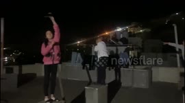 Palestinians in the West Bank Celebrate as Iranian Rockets Seen Over Israel