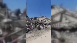 Palestinians Call for Prayer from Top of Demolished Mosque Amid Ongoing Conflict