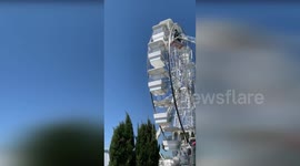 Family Rescued from Perilous Heights atop Bolsena's Panoramic Wheel, Italy