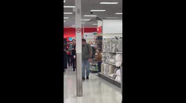 Kid plays rock paper scissors with Dwanye Johnson in Tennessee target store