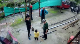 Toddler poleaxed when careless workers lift roof and timber topples over