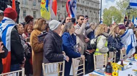British-Israeli community sing together calling for the release of the 133 remaining hostages in Seder Table installation ahead of Passover