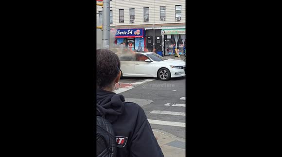 Car fire Webster Ave and Bedford park boulevard, Bronx NY , no one inside. Bystander got a fire extinguisher before FDNY got on scene , mini explosion
