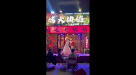 Female boss dances at Chinese street stall