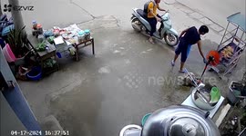 Shop owner accidentally sends his customer and motorbike into the duck roaster