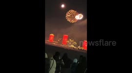 Russia: Russians watch Chinese fireworks across the river in Blagoveshchensk