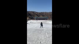 China: Beginner snow skater takes a face-plant dive in Shanxi