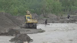 Downpours, floods add to suffering of impoverished Afghans