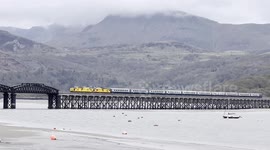 The Pathfinders Cambrian coast express charter train crossing the very famous Barmouth Bridge.