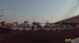 Car nosedives from bridge killing two passengers in Thailand