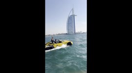 Driving a convertible car in the ocean in Dubai, fast and the furious style