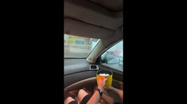 Caught in the storm: leaky car roof amid Southern China's heavy rainfall