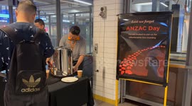 Free cups of tea given out by train station staff on ANZAC Day in Sydney, Australia