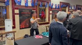 Free cups of tea given out by train station staff on ANZAC Day in Sydney, Australia