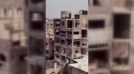 Gaza: Woman Cleans Devastated Home