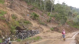 Heavy rains trigger landslides, blocking roads in Indonesia