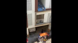 Residents rick their lives to rescue toddler dangling from apartment roof in chennai