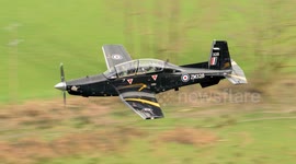 RAF Texan  T1 Aircraft routing through the Mach Loop in Wales on a low level flight