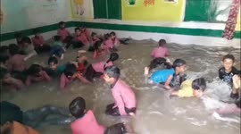 School converts classroom into SWIMMING POOL as temperatures soar above 40 degrees Celsius in northern India