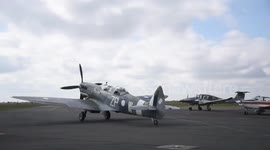 Daredevil OAP marks 86th birthday by flying upside down - in a spitfire