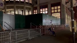 USA: Stickers are removed from the wall around Gould Plaza in NYC after Gaza Solidarity Encampment