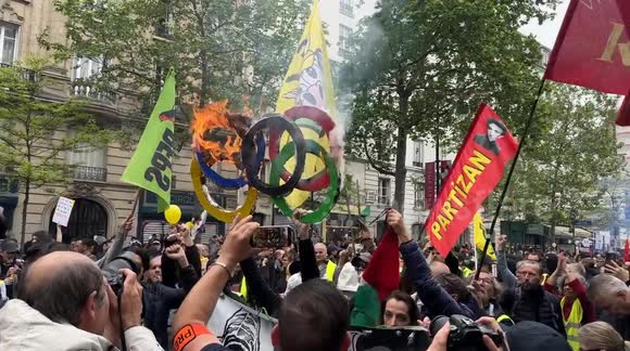 Olympic rings burnt during May Day protests in Paris