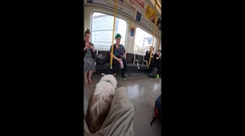 Viola spreads joy: London commuters treated to friendly train pooch