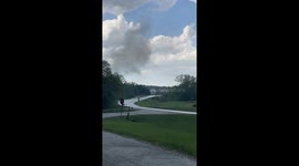 Up-close footage of tornado funnel forming and reaching the sky in Kansas