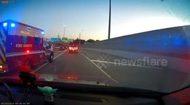 Ambulance hits me from behind.