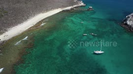 Drone video from tropical paradise Isla Isabel in front of the coast of Mexico, Sailboats anchoring, crystal clear waters