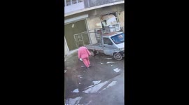 Woman slips multiple times on icy ground