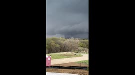 Nebraska resident captures dual tornadoes amidst siren warnings