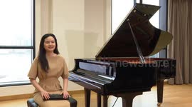 Hong Kong visually impaired singer chasing light through music