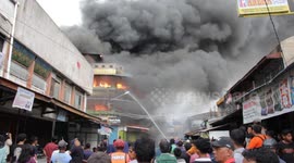 Major fire rips through market buildings in Indonesia's Padang