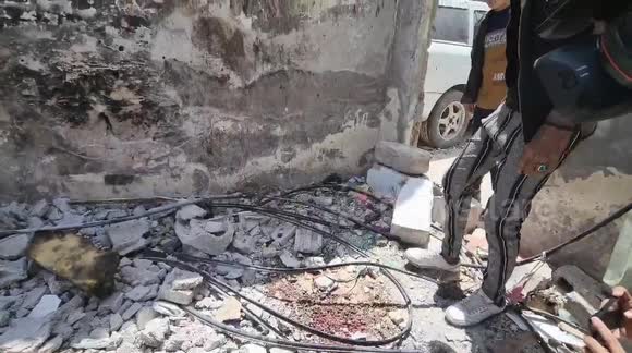 Palestinians inspect family home destroyed by Israeli strike in Rafah