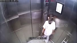 Cctv footag  from life shows Girl Bitten By Dog In Lift At Noida Apartment