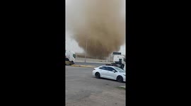 Dust devil swirls alongside Saudi road