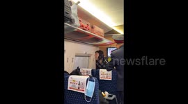Dramatic passengers’ dispute over sunshade curtain ends in compromise on high speed train