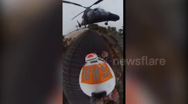 Brazil: Helicopter crew rescues 2 year-old baby in a flooding disaster zone