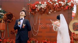 Chinese groom burst into tears as butterfly landing on his chest reminds him of late grandmother
