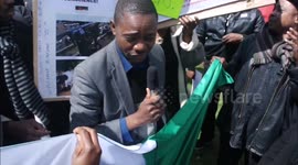 Brief altercation as Nigerian anchor man attempts to get his story 