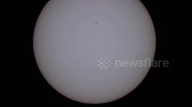 Time-lapse footage of the planet Mercury crossing the Sun