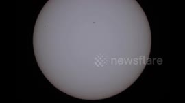 Time-lapse footage of the planet Mercury crossing the Sun