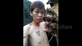 Man puts live bees in his mouth